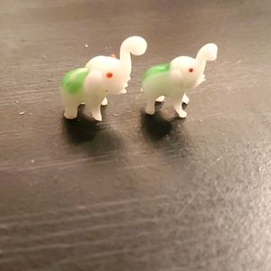 2 glass figurine elephants